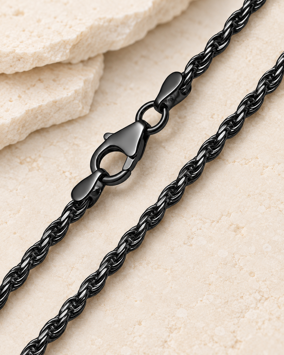 30 inch black premium women's rope chain with lobster clasp on cream stone.