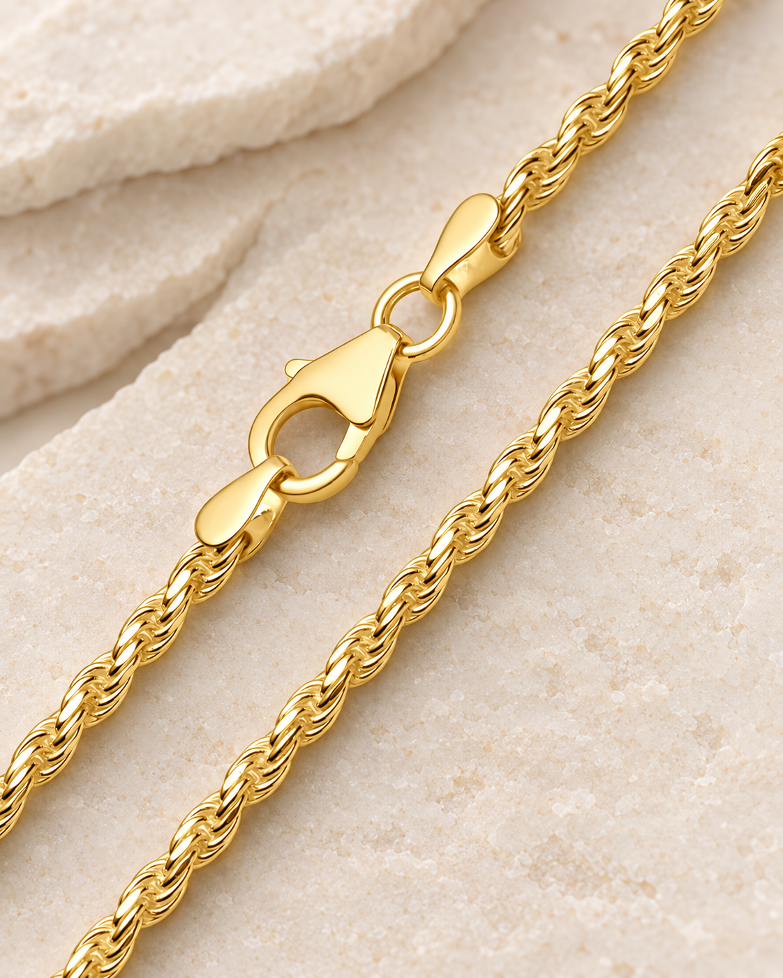 30 inch gold premium women's rope chain with lobster clasp on cream stone.