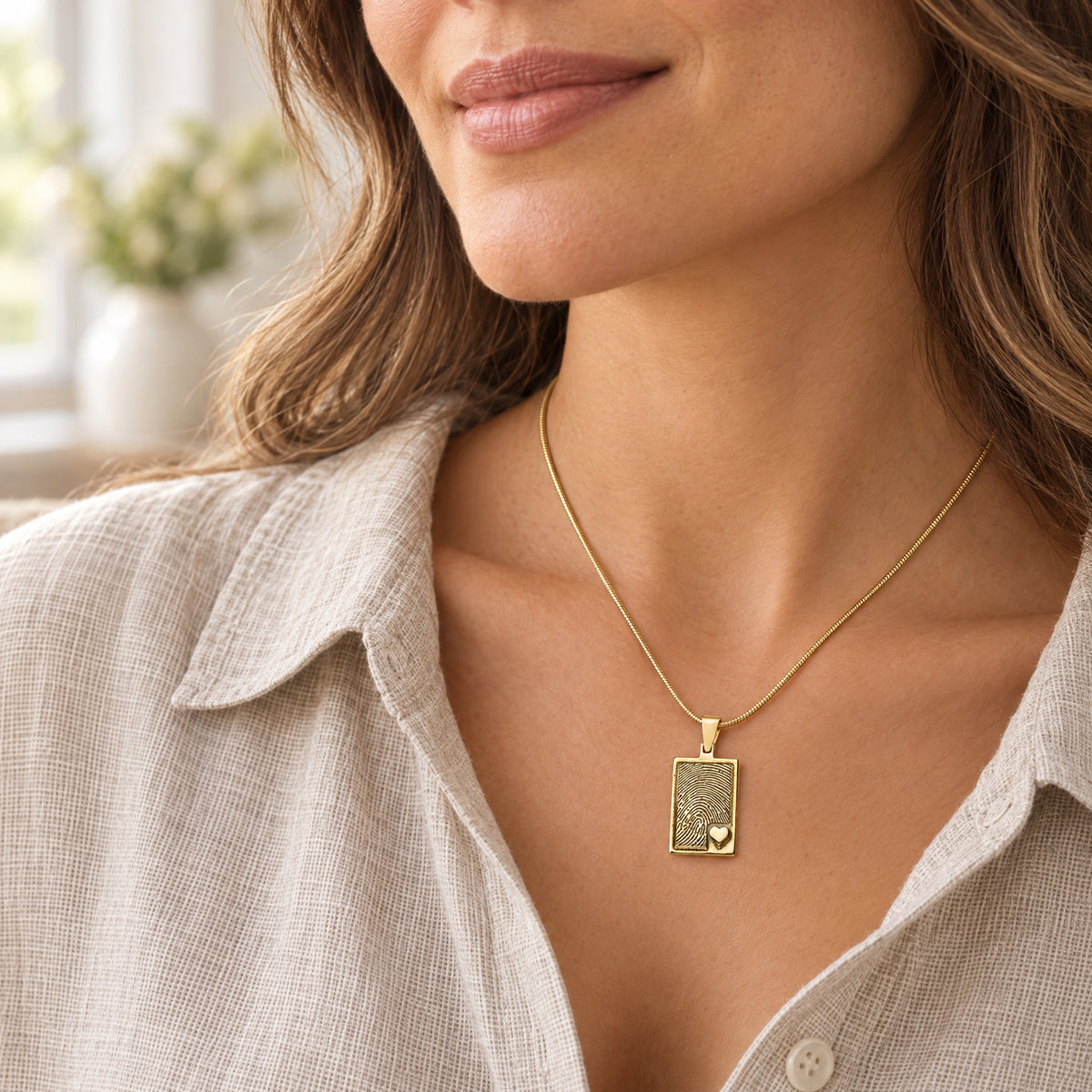 Solid 14K Gold Raised Fingerprint Rectangle Necklace — lifestyle