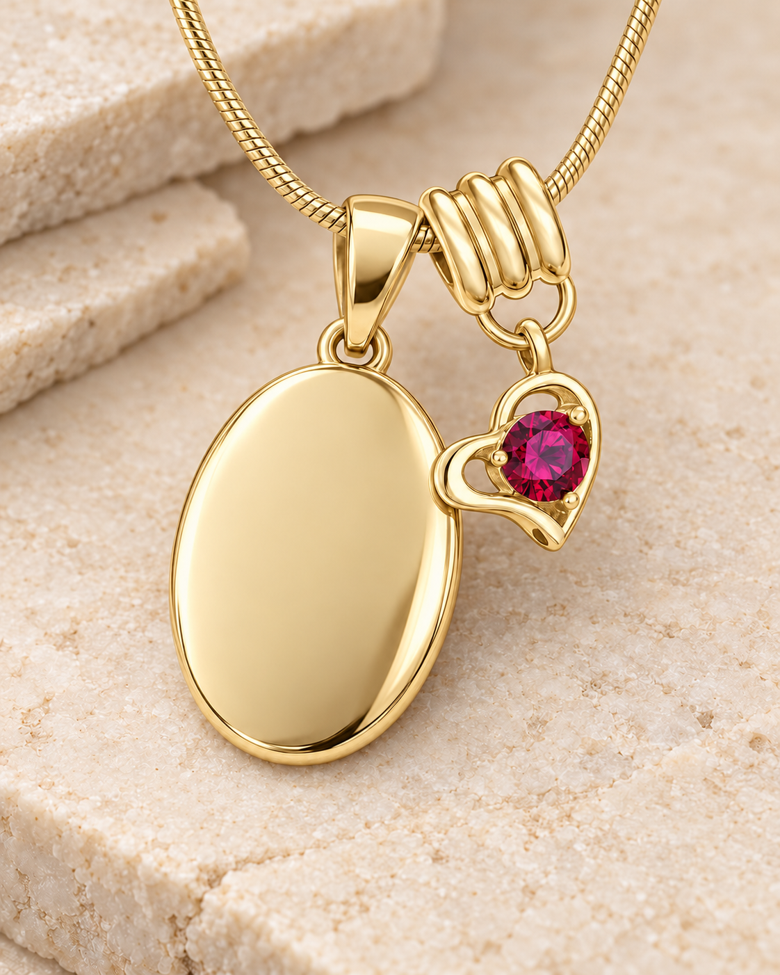 July gold birthstone heart hanger with an illustrative matching oval pendant; display pendant and chain sold separately.