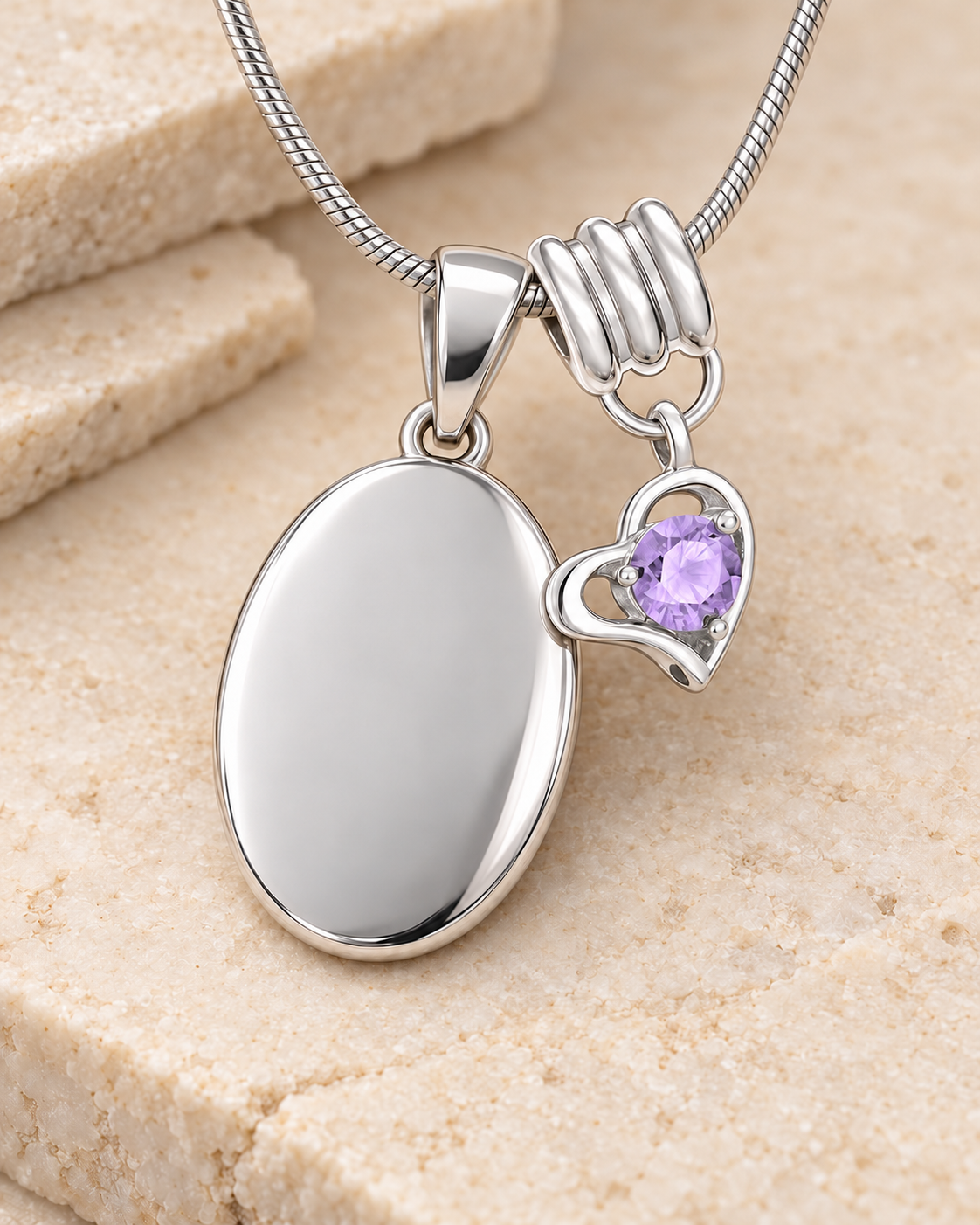 June silver birthstone heart hanger with an illustrative matching oval pendant; display pendant and chain sold separately.