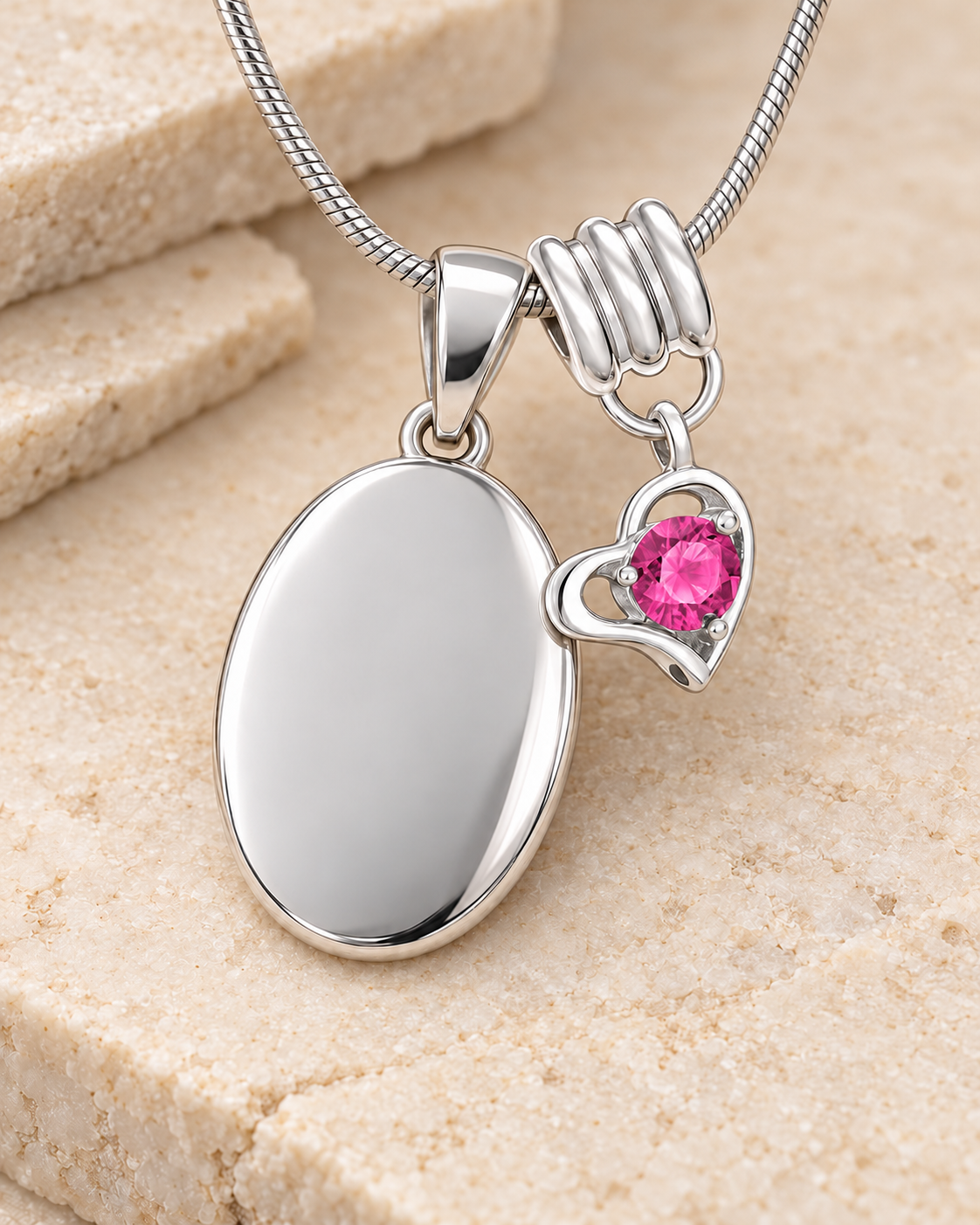 October silver birthstone heart hanger with an illustrative matching oval pendant; display pendant and chain sold separately.