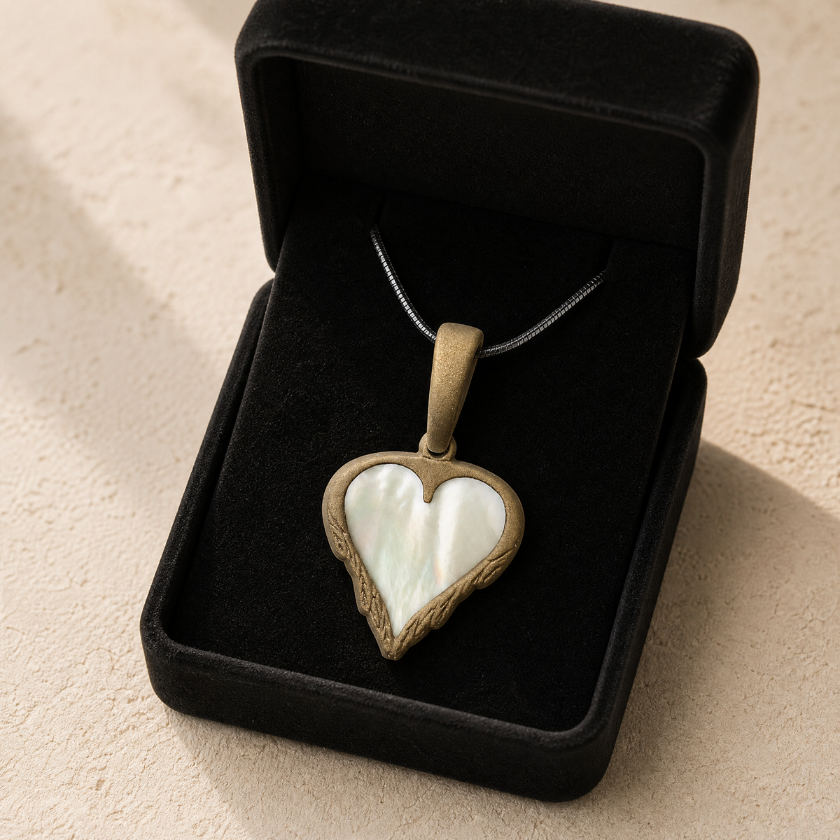 Feathered Heart Bronze Finish with Cream Ash Resin Jewelry