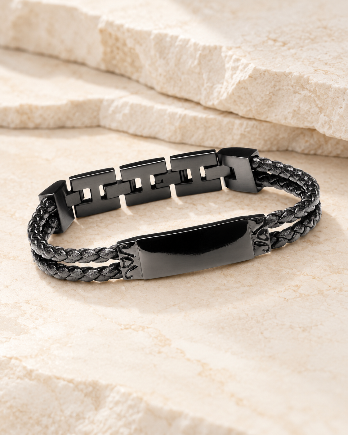Black Remembrance Bracelet Cremation Jewelry on a cream stacked-stone background