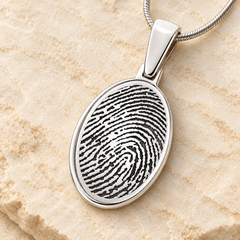 Silver oval fingerprint necklace detail