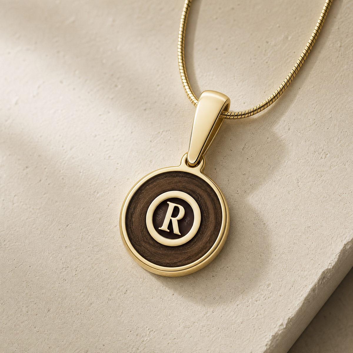 Gold Carob Monogram Ash Resin Jewelry