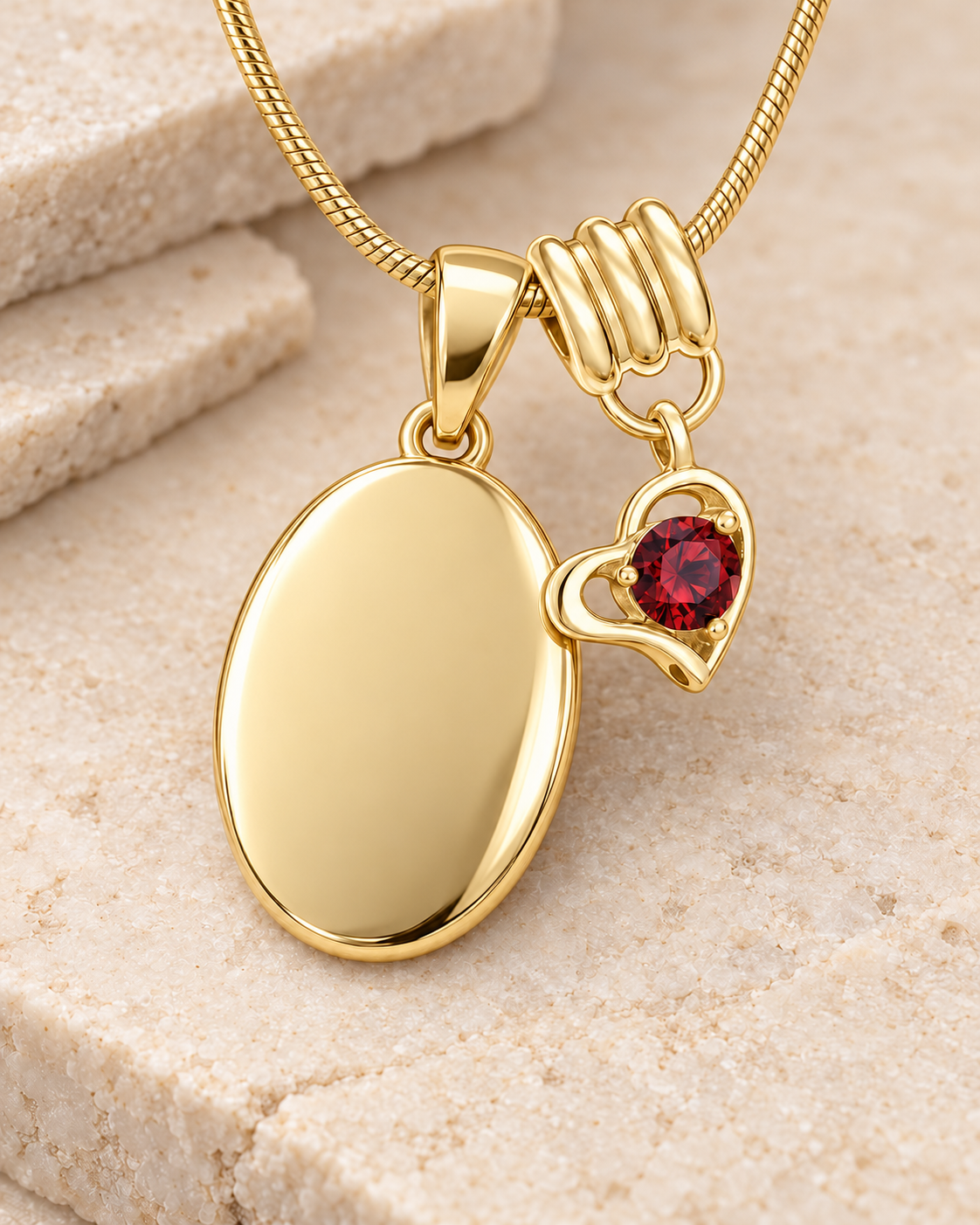 January gold birthstone heart hanger with an illustrative matching oval pendant; display pendant and chain sold separately.